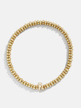 BaubleBar F - Gold beaded stretch bracelet
