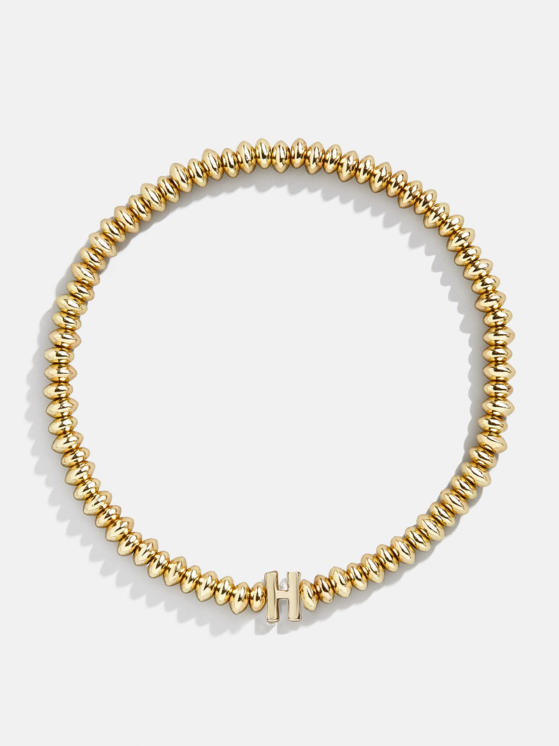 BaubleBar H - Gold beaded stretch bracelet
