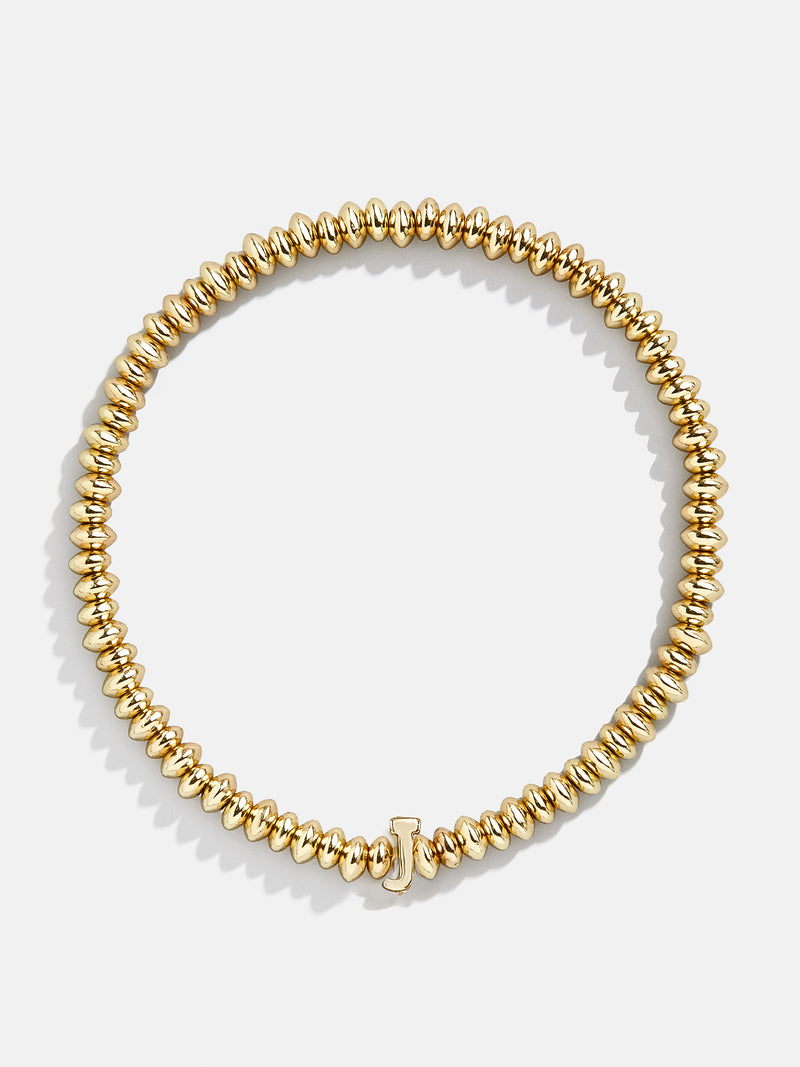 BaubleBar J - Gold beaded stretch bracelet