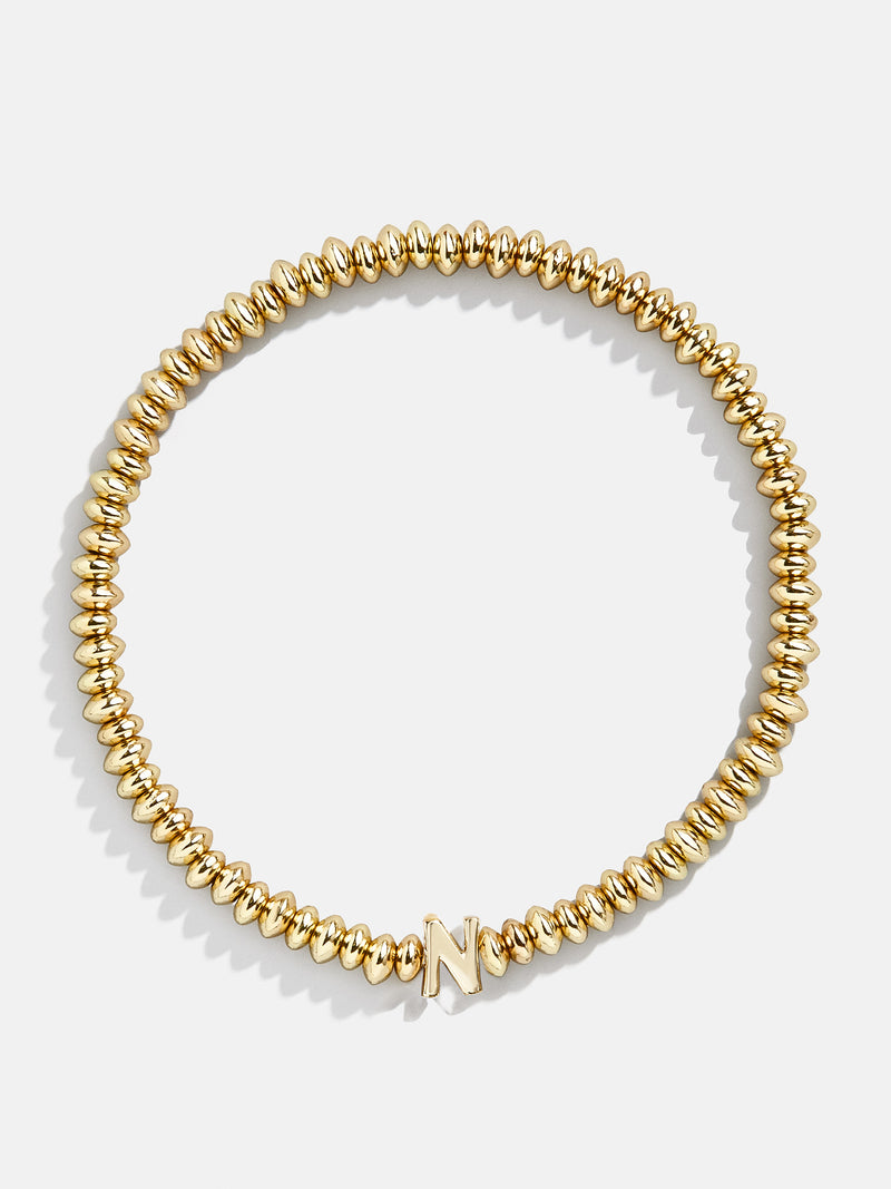 BaubleBar N - Gold beaded stretch bracelet