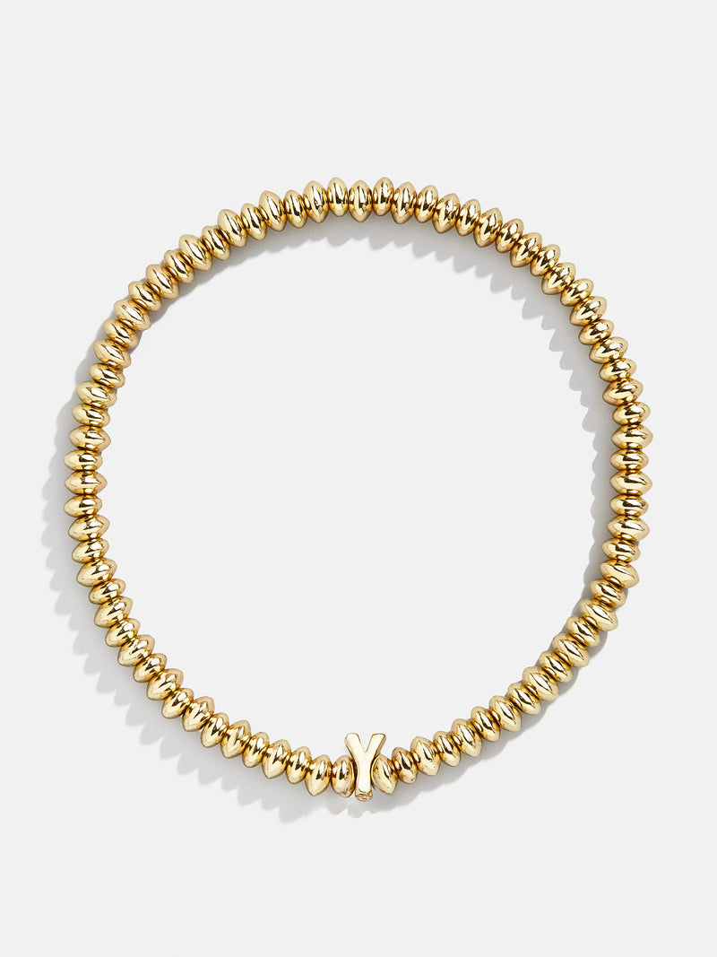 BaubleBar Y - Gold beaded stretch bracelet