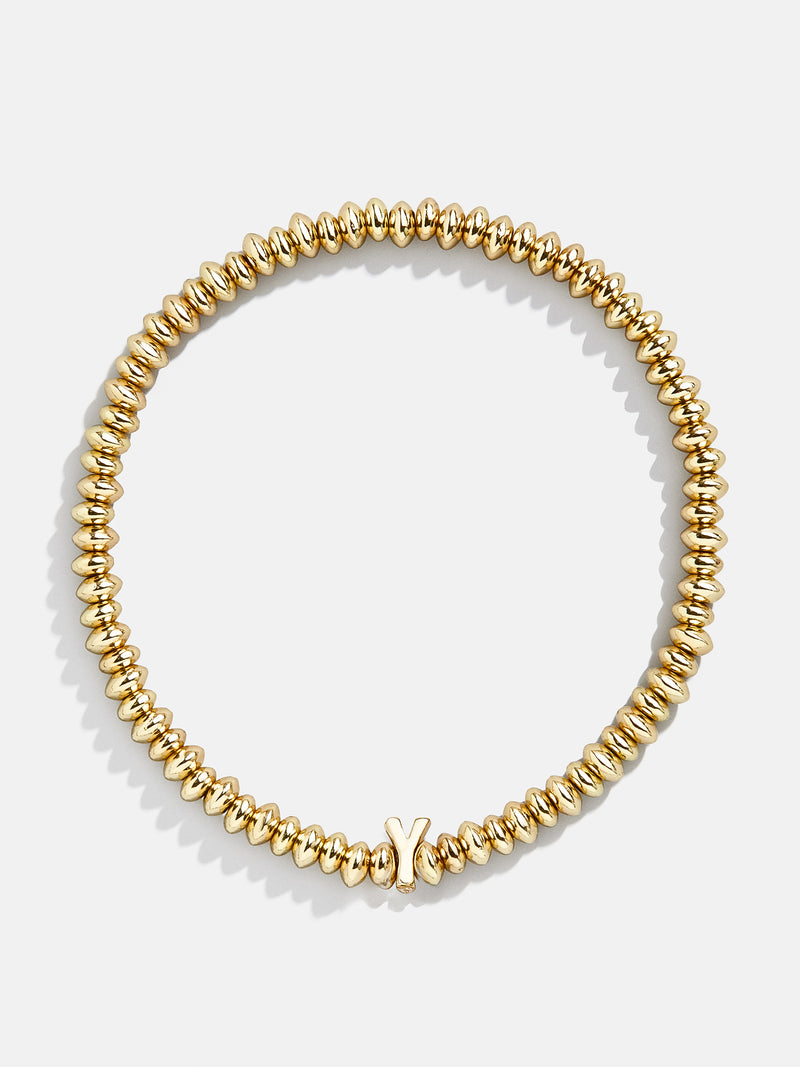 BaubleBar Y - Gold beaded stretch bracelet