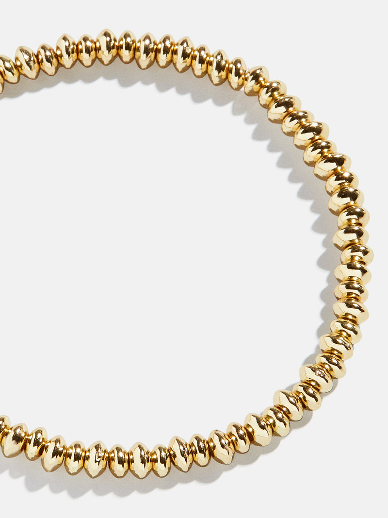 BaubleBar Paris Bracelet - Gold - 
    Gold beaded stretch bracelet - Also offered in small wrist sizes
  
