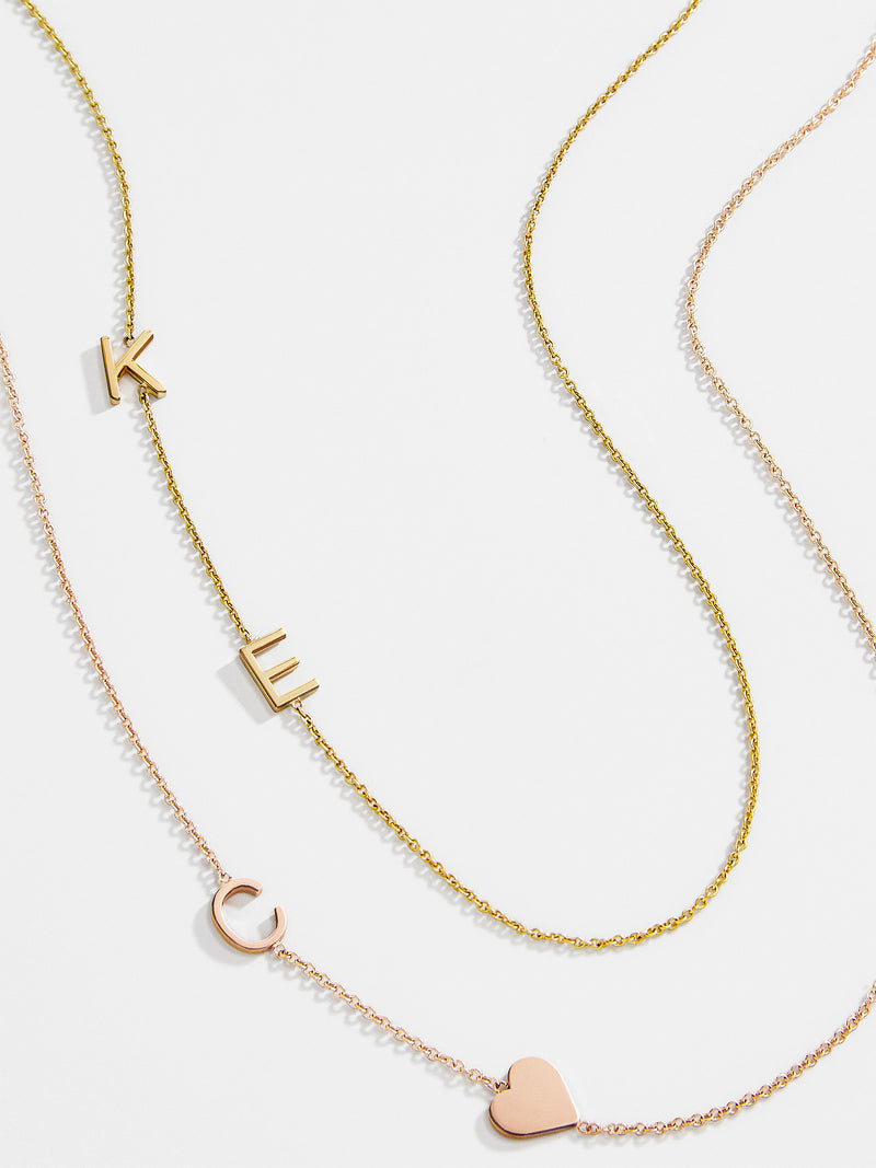 BaubleBar Maya Brenner Asymmetrical Custom Initial Necklace - Double Letter - 
    Solid White Gold, Rose Gold, or Yellow Gold
  
