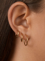 BaubleBar Verbena 18K Gold Earrings - 10MM - 
    18K Gold Plated Sterling Silver or Sterling Silver - Offered in multiple sizes
  
