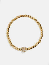 BaubleBar W - 
    Gold beaded stretch bracelet
  
