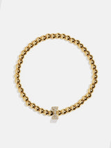 BaubleBar I - 
    Gold beaded stretch bracelet
  
