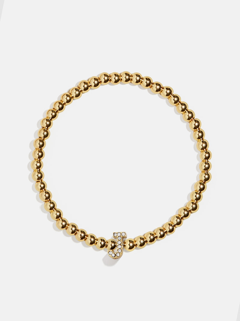 BaubleBar J  - 
    Gold beaded stretch bracelet
  
