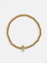 BaubleBar Q - 
    Gold beaded stretch bracelet
  
