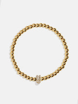 BaubleBar U - 
    Gold beaded stretch bracelet
  
