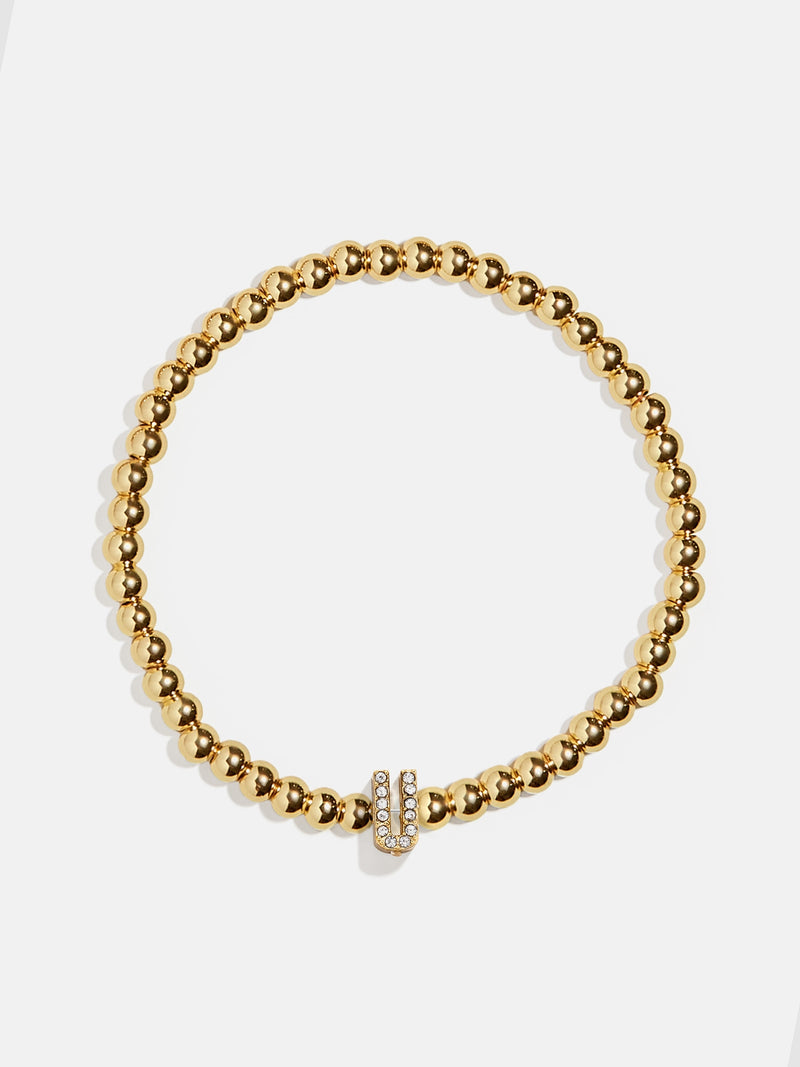 BaubleBar U - 
    Gold beaded stretch bracelet
  
