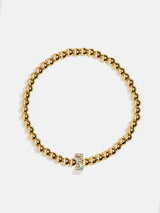 BaubleBar Z - 
    Gold beaded stretch bracelet
  
