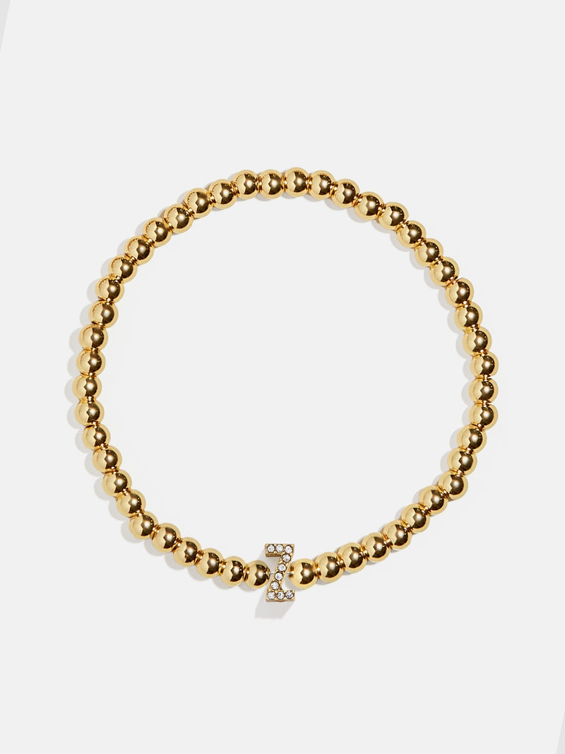 BaubleBar Z - 
    Gold beaded stretch bracelet
  
