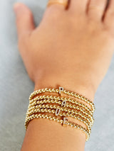 BaubleBar Initial Pisa Bracelet - Pavé Vertical - 
    Gold beaded stretch bracelet
  
