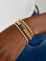 BaubleBar Atlanta Falcons NFL Gold Pisa Bracelet - Atlanta Falcons - NFL beaded stretch bracelet