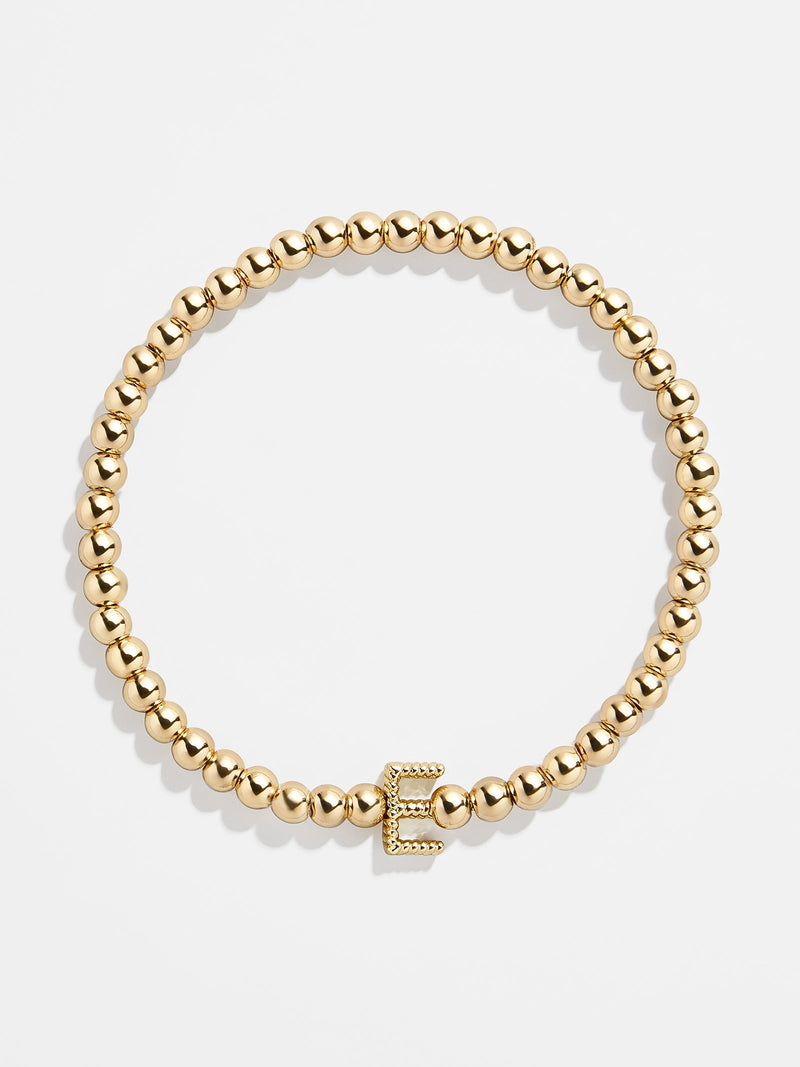 BaubleBar E - 
    Gold beaded stretch bracelet
  
