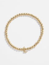 BaubleBar L - 
    Gold beaded stretch bracelet
  

