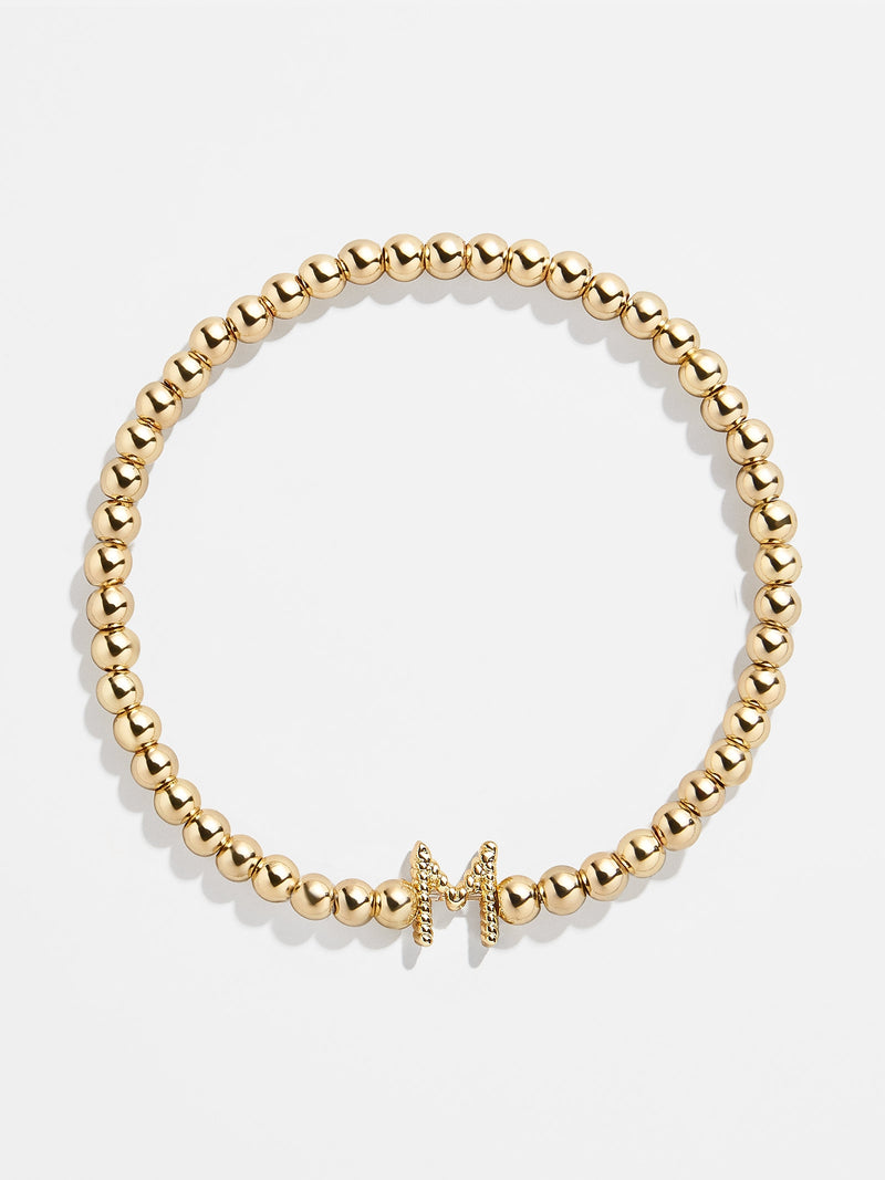 BaubleBar M - 
    Gold beaded stretch bracelet
  
