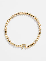 BaubleBar Gold / P - 
    Gold beaded stretch bracelet
  
