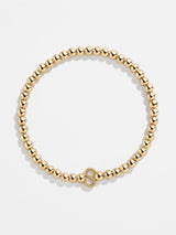 BaubleBar S - 
    Gold beaded stretch bracelet
  
