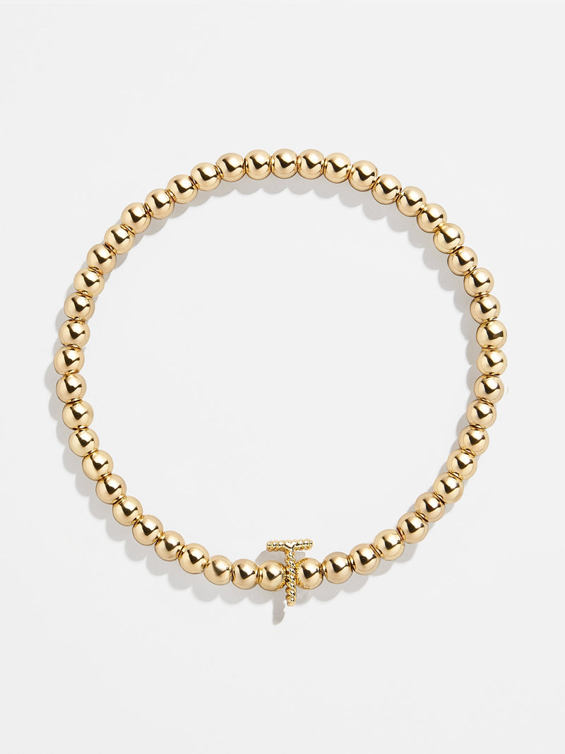 BaubleBar T - 
    Gold beaded stretch bracelet
  
