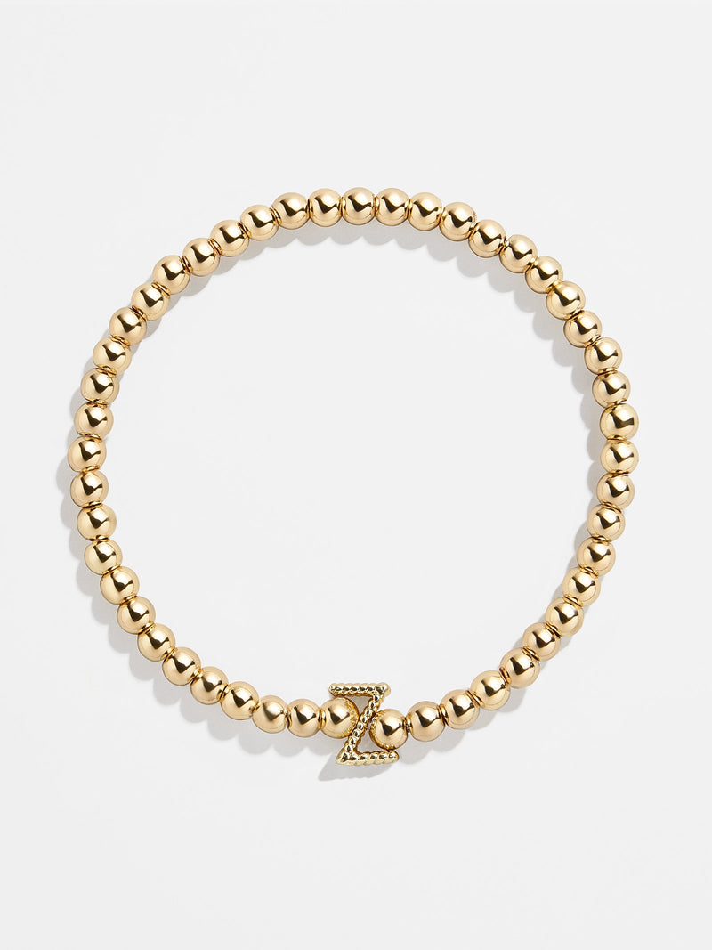 BaubleBar Z - 
    Gold beaded stretch bracelet
  
