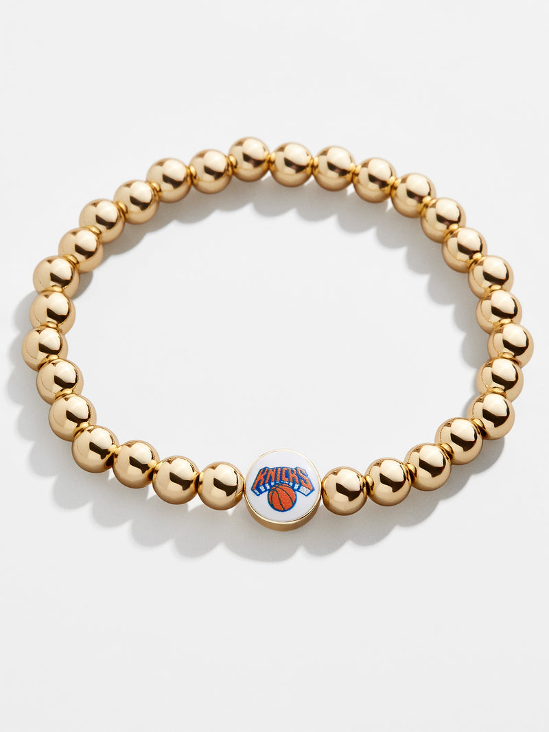 BaubleBar New York Knicks Gold Pisa Bracelet - New York Knicks - 
    NBA beaded stretch bracelet
  
