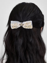 BaubleBar NFL Hair Bow - New Orleans Saints - NFL hair accessory