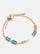 BaubleBar Miami Dolphins NFL Gold Slogan Bracelet - Miami Dolphins - NFL pull-tie bracelet