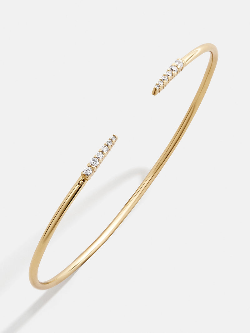BaubleBar Rima 18K Gold Cuff Bracelet - Smooth Gold - 
    18K Gold Plated Sterling Silver, Cubic Zirconia stones
  

