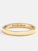 BaubleBar Daria Ring - Gold - 
    Gold band stacking ring
  
