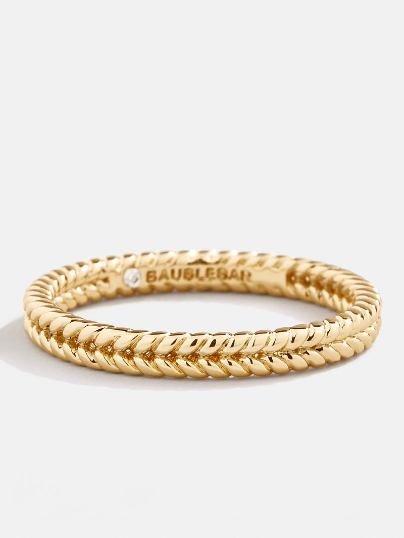 BaubleBar Nyla Ring - Gold - 
    Gold braided stacking ring
  
