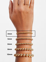 BaubleBar Joelle Pisa Bracelet - Clear/Gold - 
    Gold beaded stretch bracelet - Also offered in small wrist sizes
  
